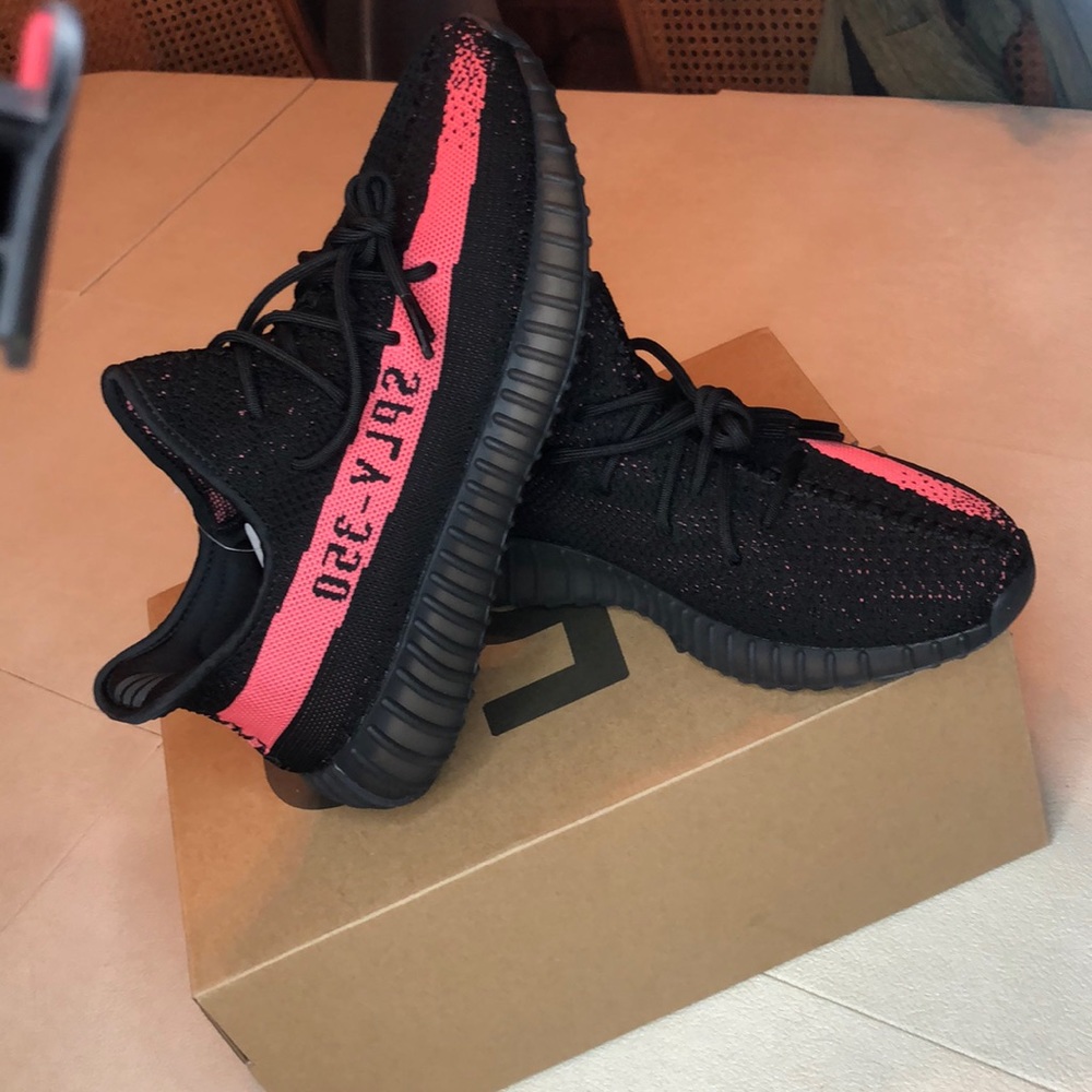 Black w/ Pink strip Yeezy’s